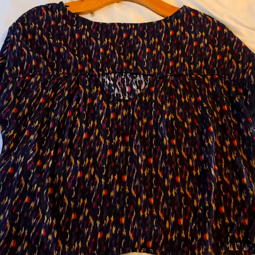 Short with peek a boo back slit very small slit